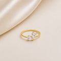 Célinor „Duo Éclat“ Ring – Goldener Doppel-Tropfen Zirkonia Ring mit funkelnden Steinen