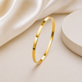 Célinor Goldener Armreif – Minimalistischer Hochglanz Bangle für Damen