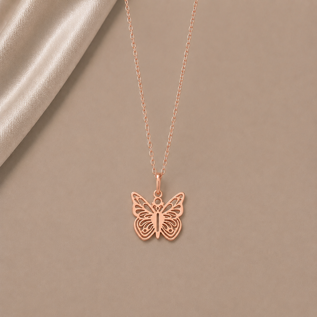 Célinor Butterfly Glow – Elegante Schmetterlings Halskette in Gold, Rosegold & Silber